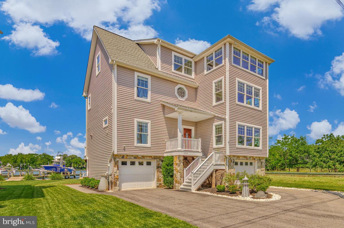 3300 Shore Drive Annapolis, MD 21403 - Photo 2 of 50 front view of a house with a yard