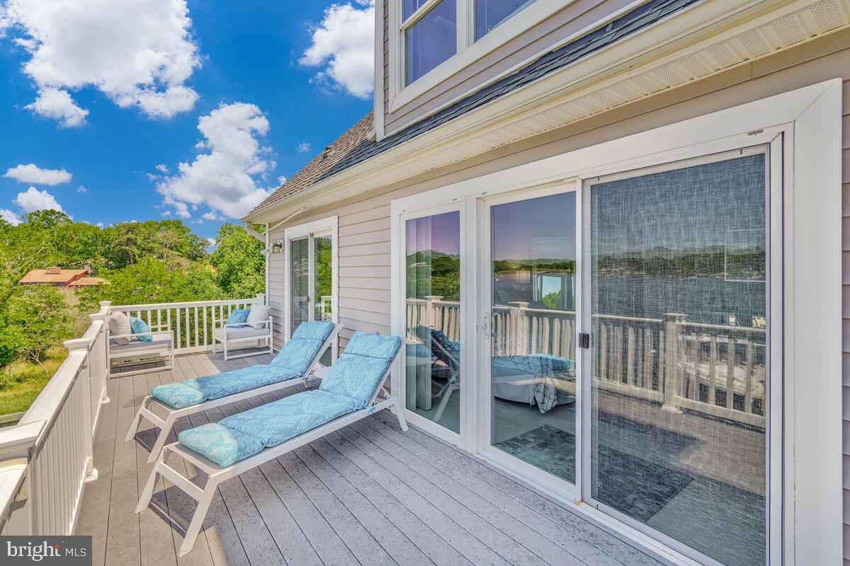3300 Shore Drive Annapolis, MD 21403 - Photo 21 of 50 a view of a balcony with furniture
