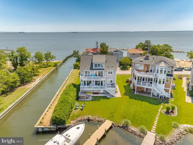 swimming pool view with a seating space