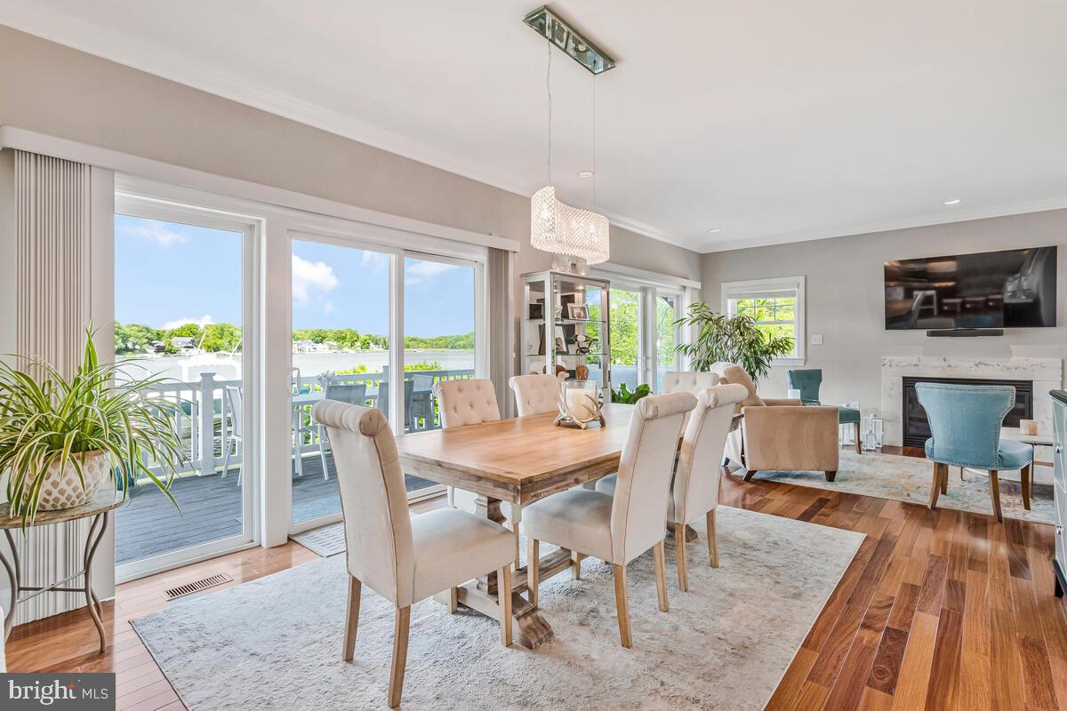 3300 Shore Drive Annapolis, MD 21403 - Photo 7 of 50 a view of a dining room with furniture window and wooden floor