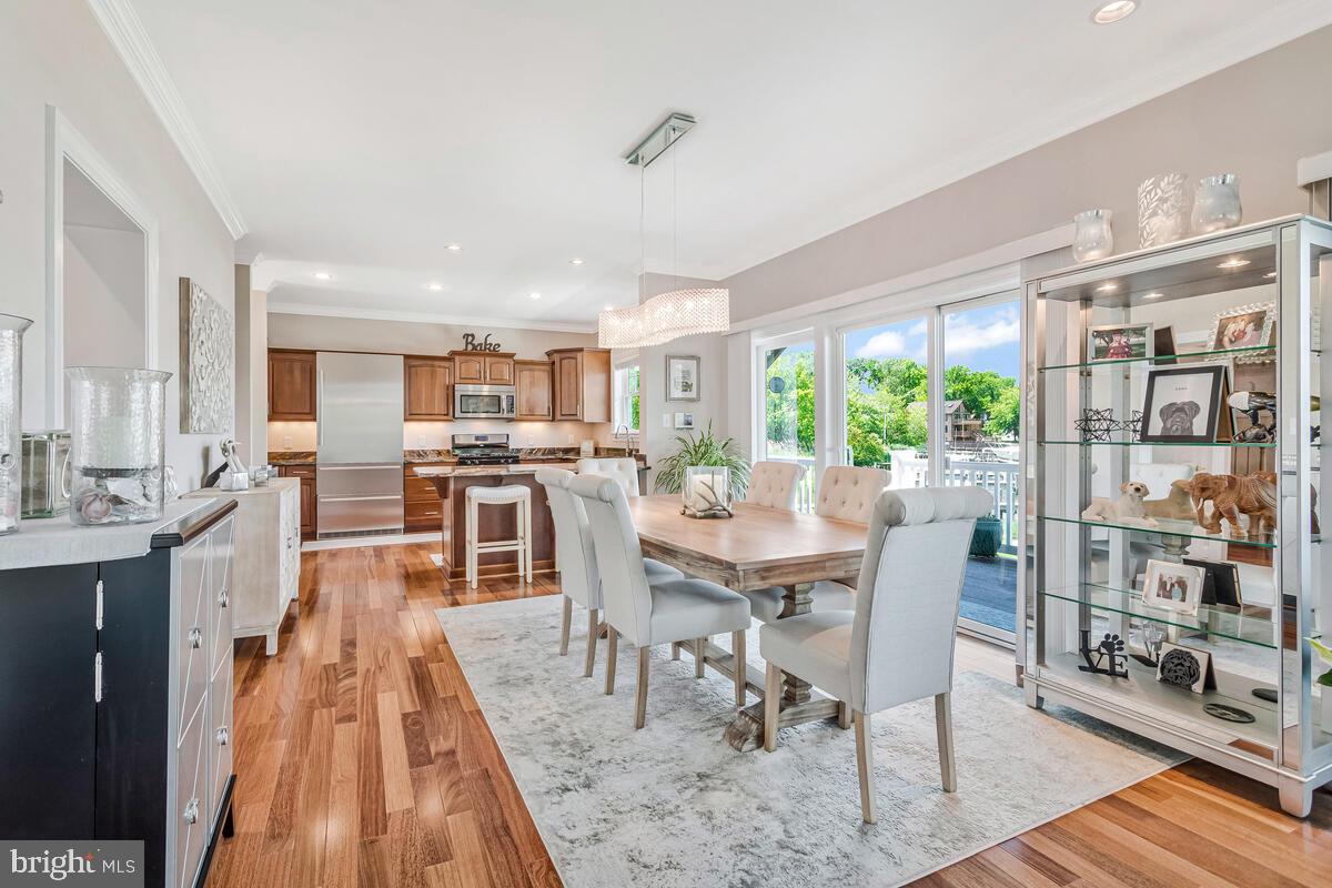 3300 Shore Drive Annapolis, MD 21403 - Photo 10 of 50 a view of a dining room with furniture window and wooden floor