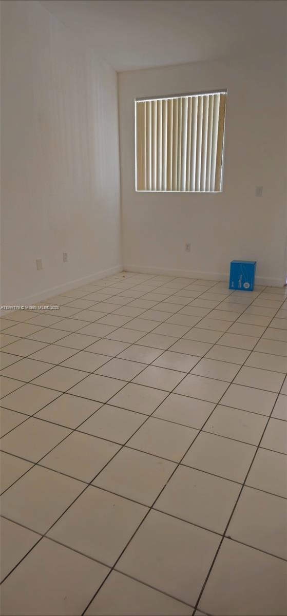 2551 Southeast 16th Terrace, Unit 202 Homestead, FL 33035 - Photo 11 of 21 a view of a window and an empty room