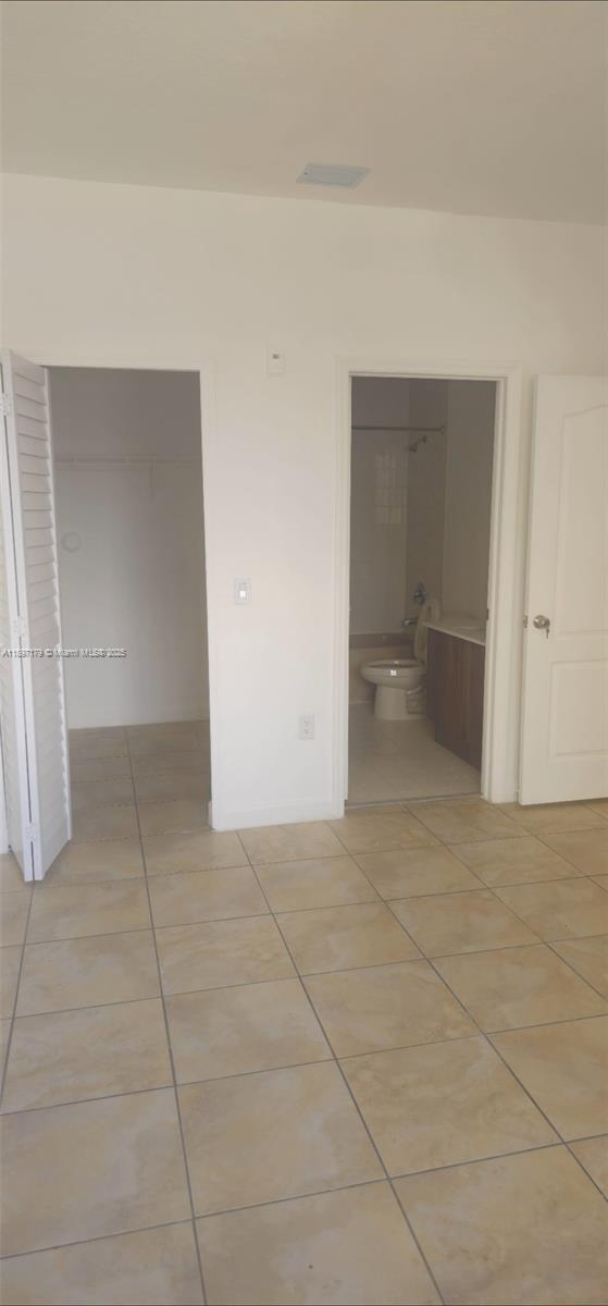 2551 Southeast 16th Terrace, Unit 202 Homestead, FL 33035 - Photo 10 of 21 a view of an empty room with a bathroom
