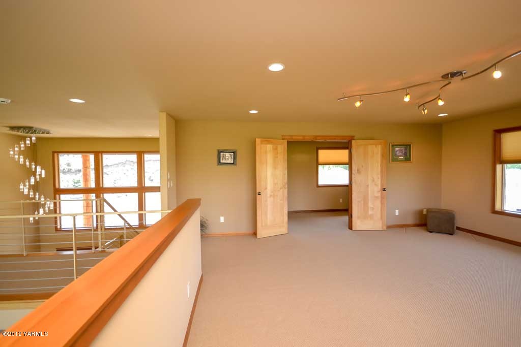 6120 South Naches Road Naches, WA 98937 - Photo 22 of 35 a view of an empty room with a window