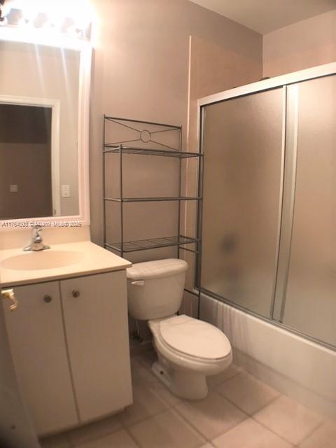 8253 Southwest 29th Street, Unit 104 Miramar, FL 33025 - Photo 13 of 17 a bathroom with a sink a toilet a mirror and shower