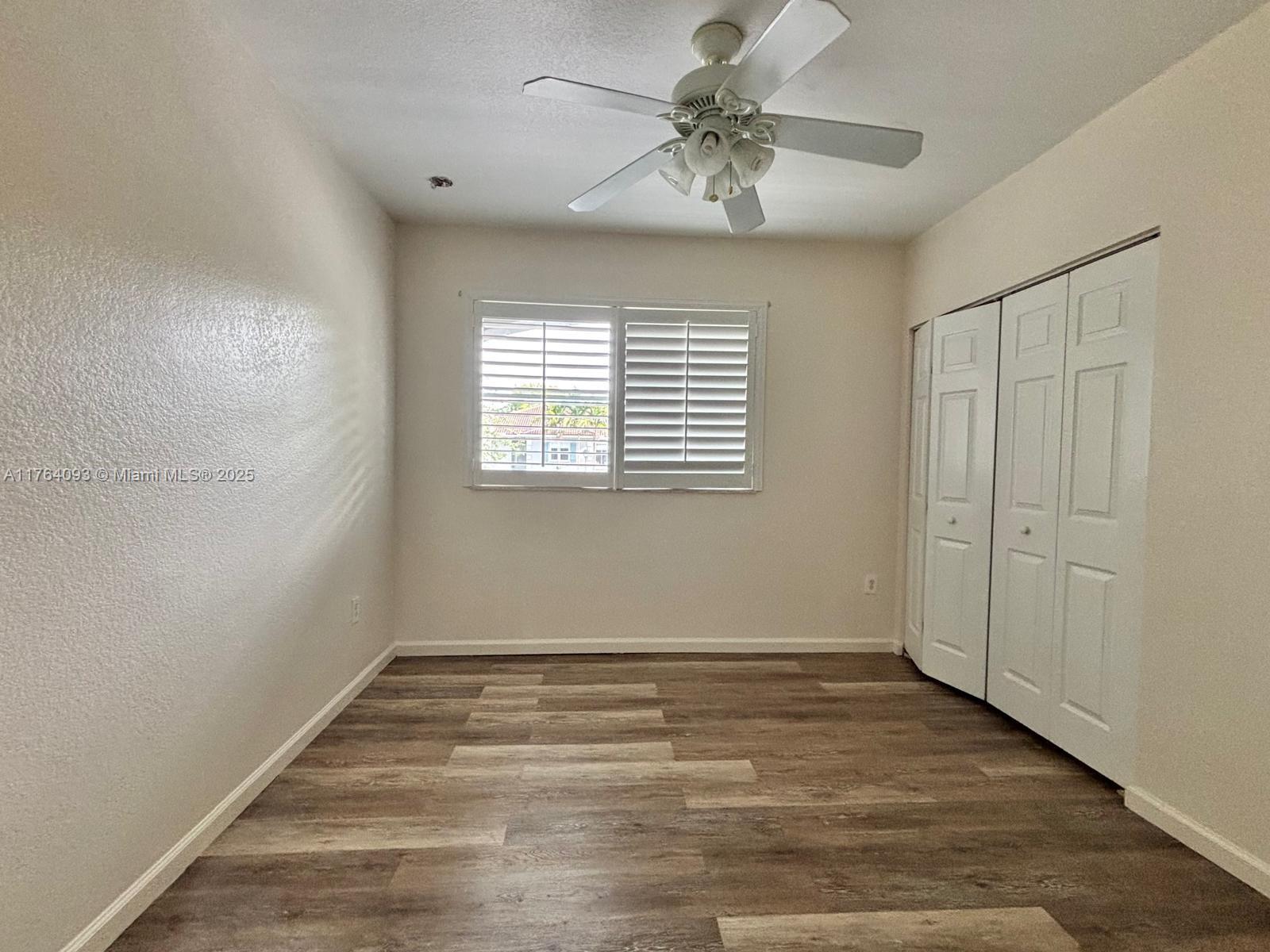 8253 Southwest 29th Street, Unit 104 Miramar, FL 33025 - Photo 14 of 17 a view of an empty room with a window
