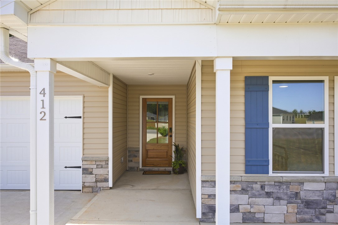 412 Chadwick Lane Walhalla, SC 29691 - Photo 31 of 37 Welcome home to this inviting facade featuring durable siding, stone accents, and a covered entry.