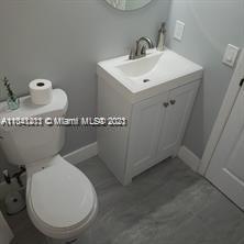 Lakes of Jacaranda Condominiums Plantation, FL 33324 - Photo 14 of 29 a bathroom with a sink and a toilet