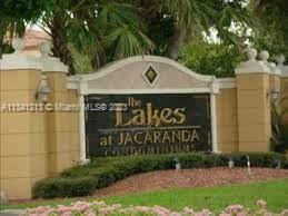 Lakes of Jacaranda Condominiums Plantation, FL 33324 - Photo 24 of 29 a view of sign board