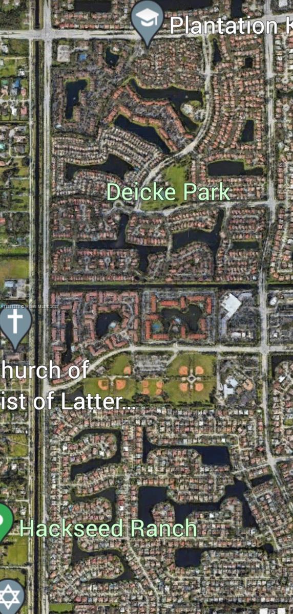 Lakes of Jacaranda Condominiums Plantation, FL 33324 - Photo 26 of 29 a view of a glass door with glass door