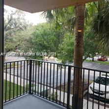 Lakes of Jacaranda Condominiums Plantation, FL 33324 - Photo 3 of 29 a view of a wooden street from a balcony