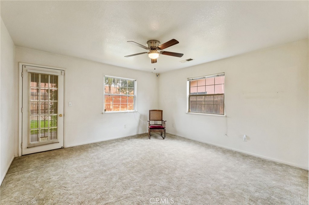 952 Upp Court Hanford, CA 93230 - Photo 19 of 35 a view of an empty room with a window
