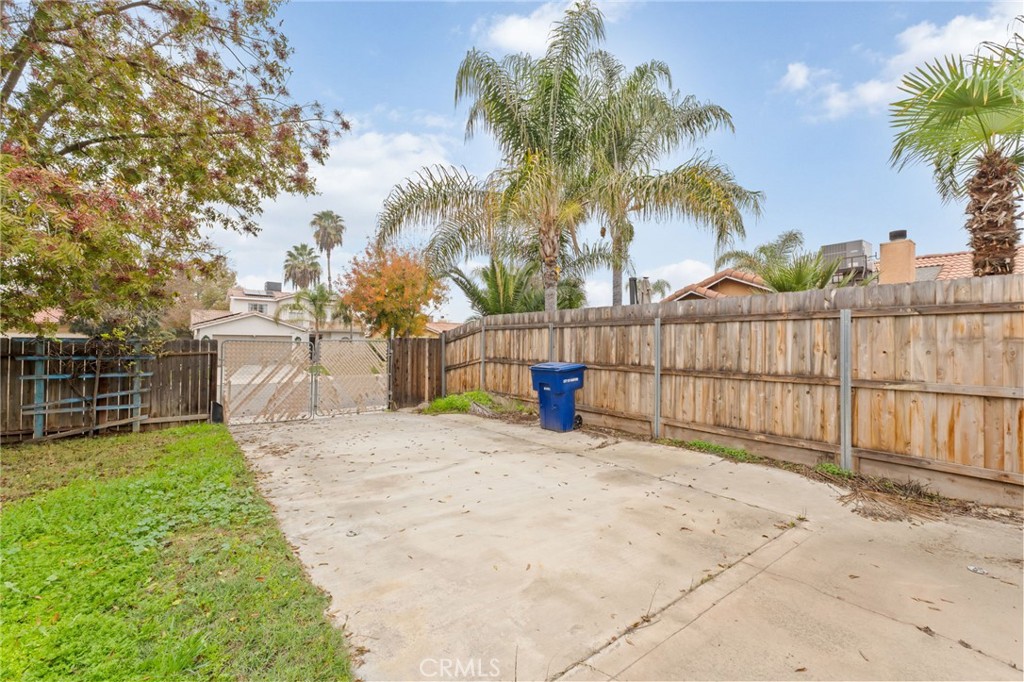 952 Upp Court Hanford, CA 93230 - Photo 24 of 35 a view of a backyard with palm tree