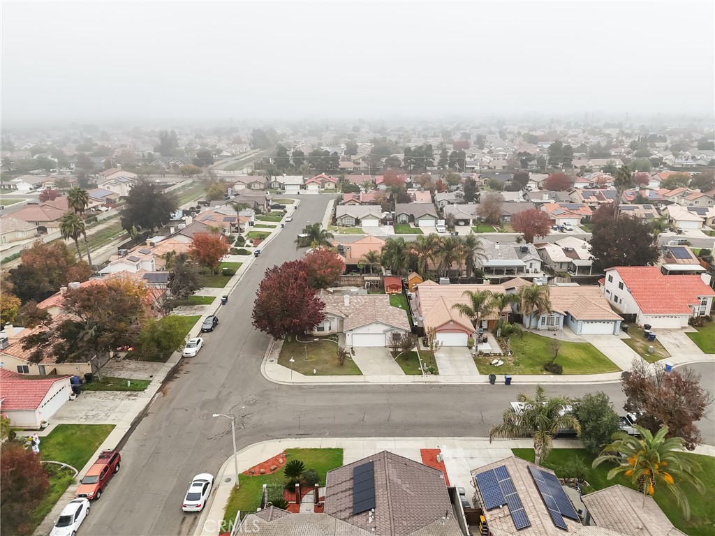 952 Upp Court Hanford, CA 93230 - Photo 31 of 35 an aerial view of residential houses with outdoor space
