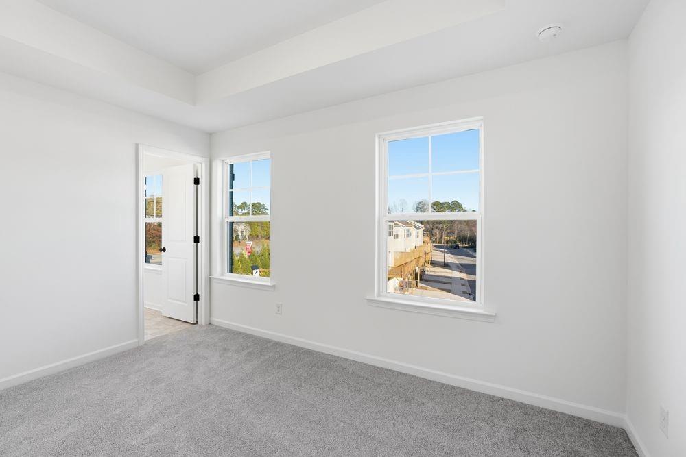 5708 Schelton Place Southeast Mableton, GA 30126 - Photo 27 of 48 a view of an empty room with window and wooden floor