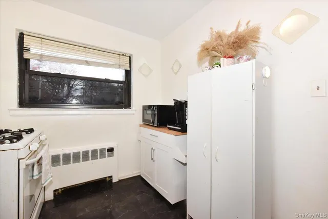 a view of hallway with washer and dryer