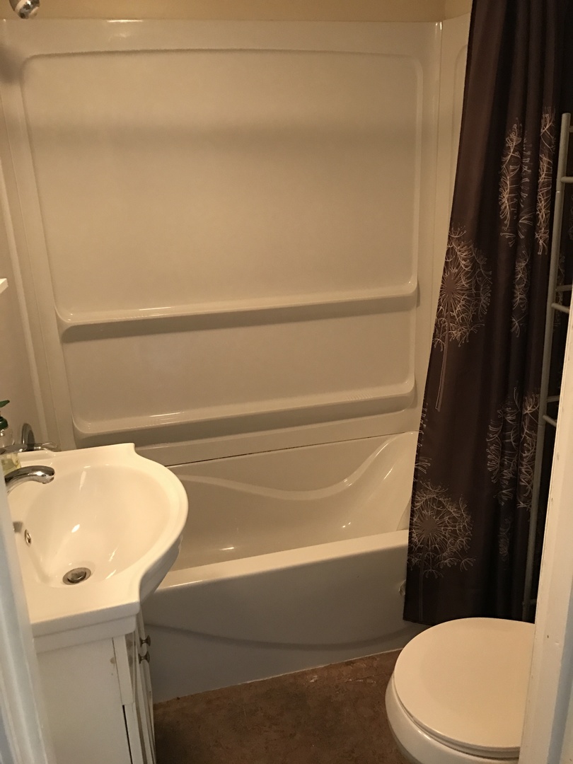 819 Price Street Morris, IL 60450 - Photo 7 of 10 a bathroom with a sink and toilet