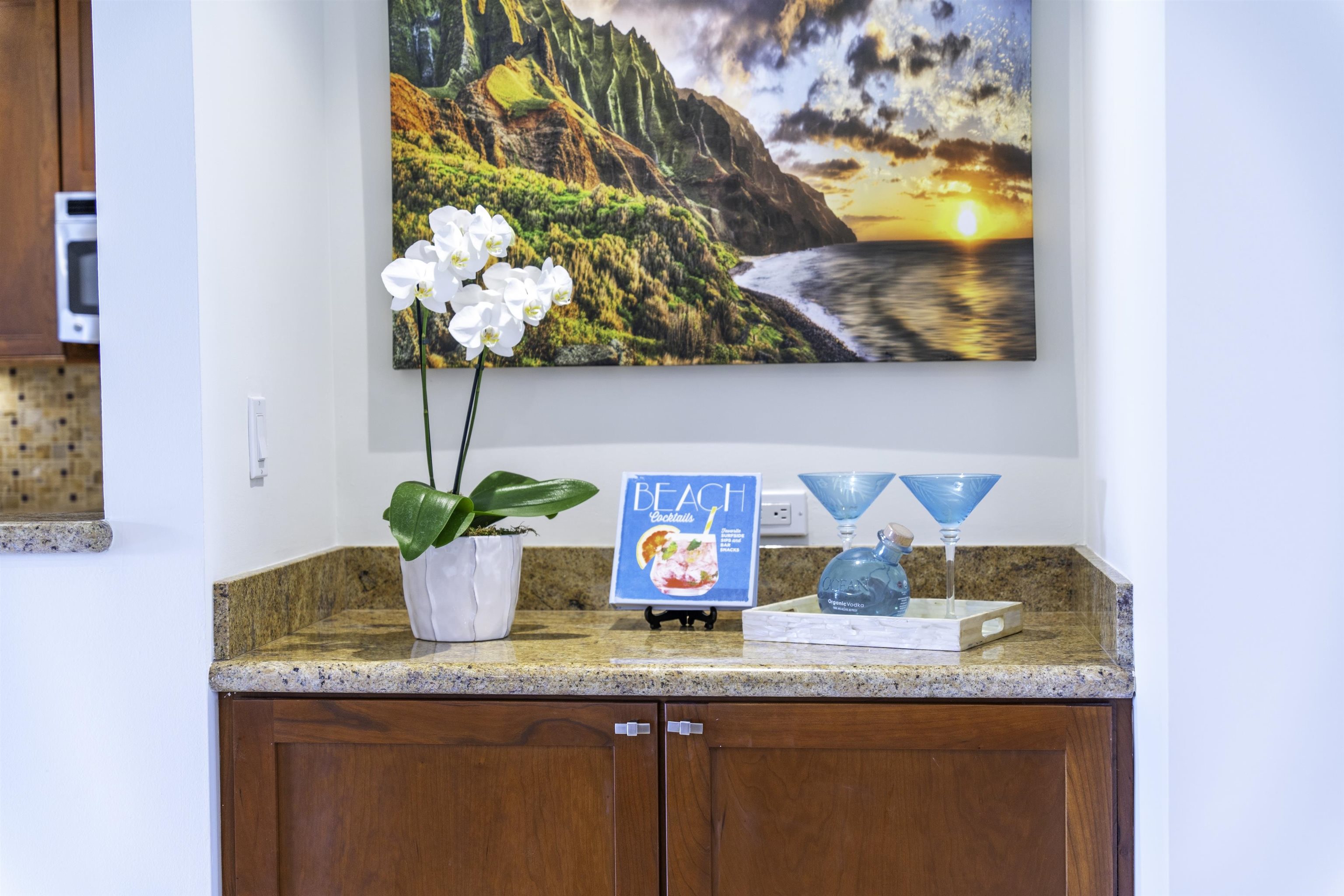 100 Ridge Road, Unit 232324 Lahaina, HI 96761 - Photo 14 of 50 a kitchen with granite countertop a sink and a white cabinets