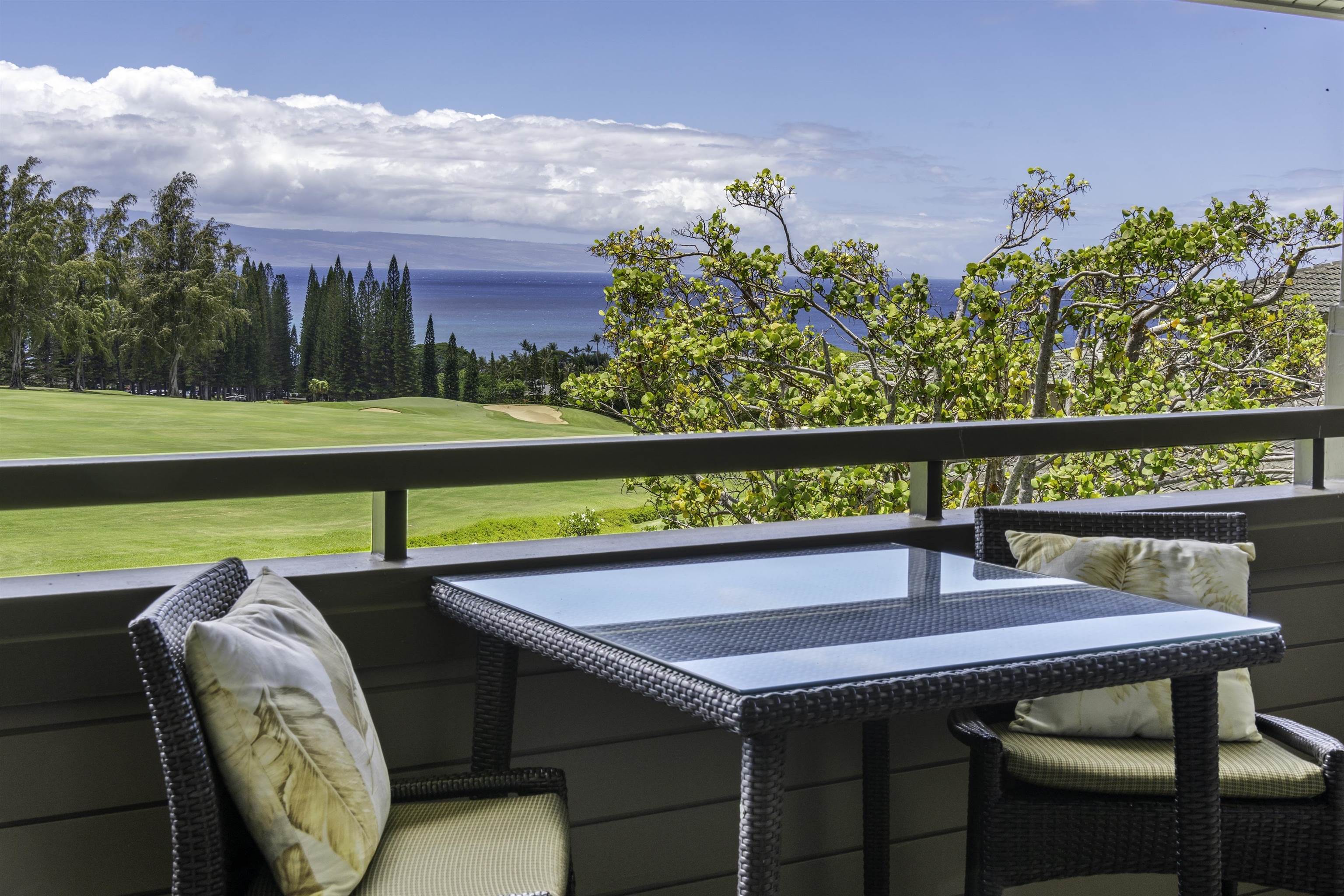 100 Ridge Road, Unit 232324 Lahaina, HI 96761 - Photo 25 of 50 a view of a chairs and table in patio