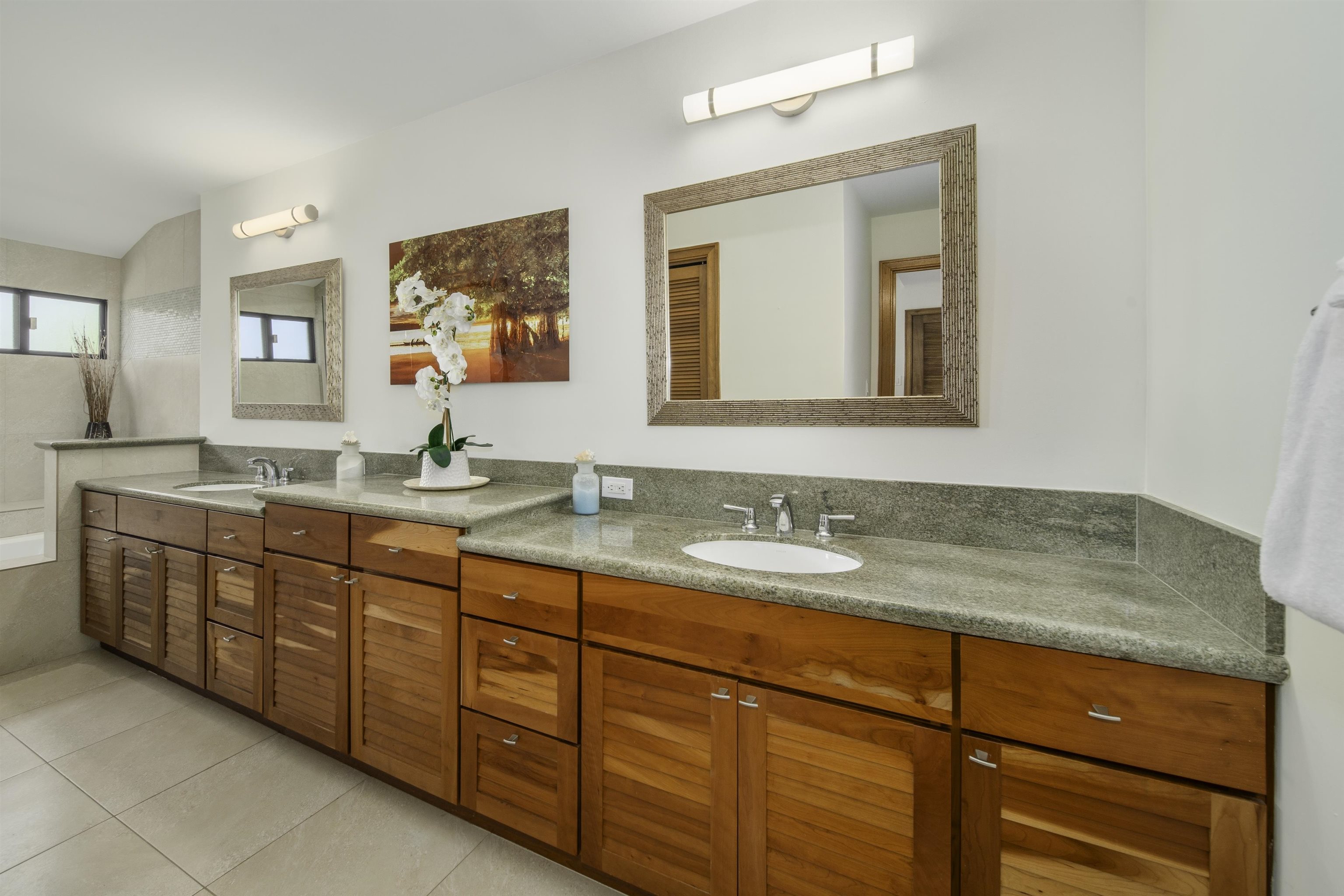 100 Ridge Road, Unit 232324 Lahaina, HI 96761 - Photo 38 of 50 a bathroom with double vanity sink two mirror and a window