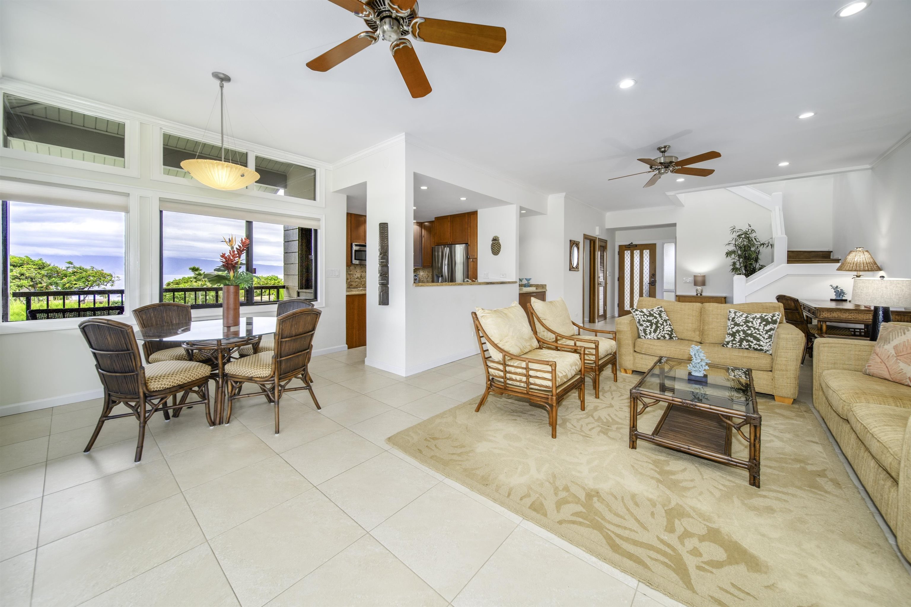 100 Ridge Road, Unit 232324 Lahaina, HI 96761 - Photo 6 of 50 a living room with furniture a rug and a window