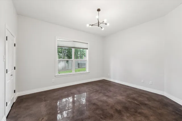 an empty room with windows