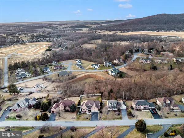 a view of balcony with furniture and wooden floor