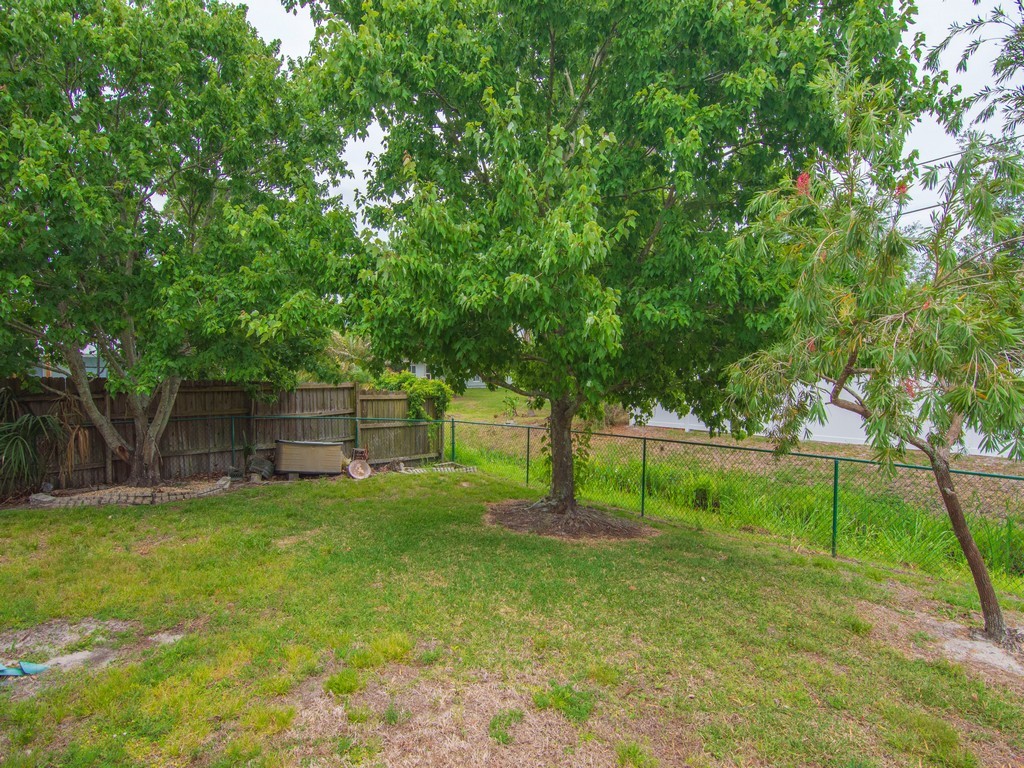 717 Doctor Avenue Sebastian, FL 32958 - Photo 31 of 33 a view of a backyard with green space