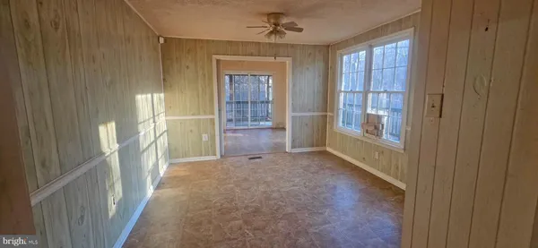 a view of hallway with windows