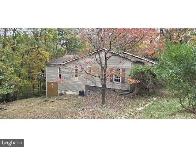 a house view with a outdoor space