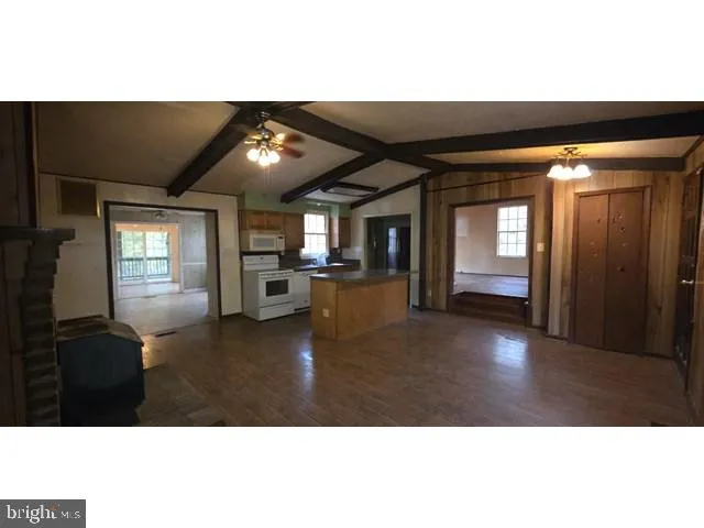 a view interior of a house an entryway and fire place