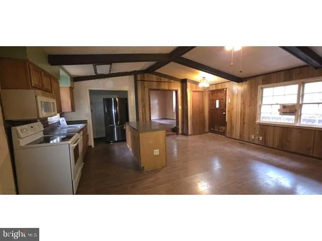 a view of swimming pool with seating space