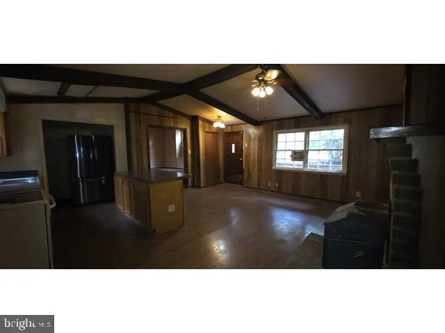 a view of an empty room and window