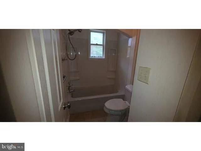 a open hall with wooden floor