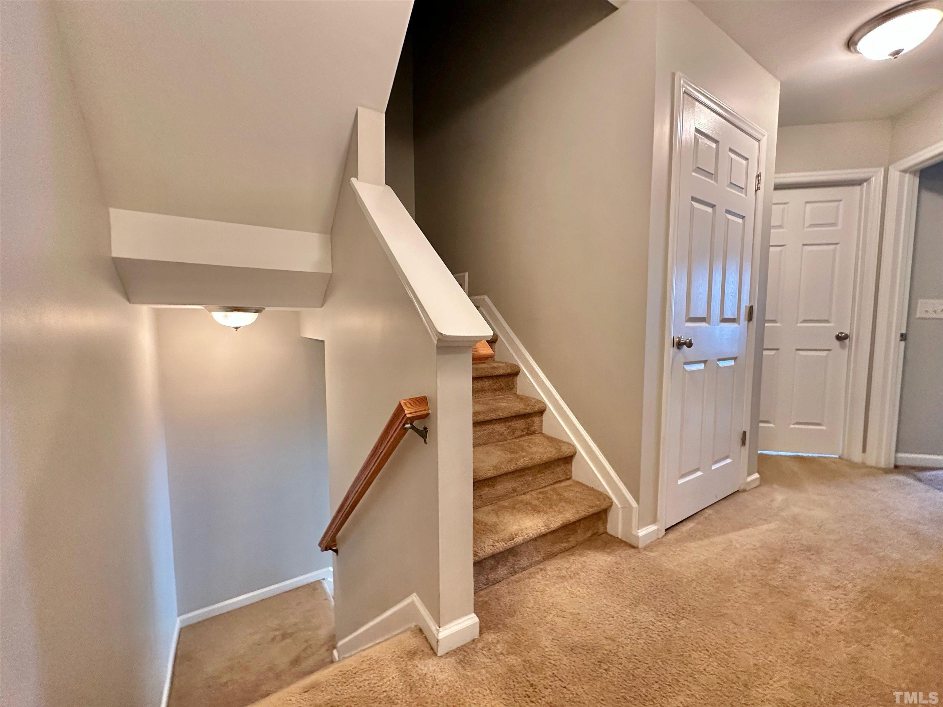 330 Gilman Lane, Unit 110 Raleigh, NC 27610 - Photo 6 of 13 a view of hallway with stairs