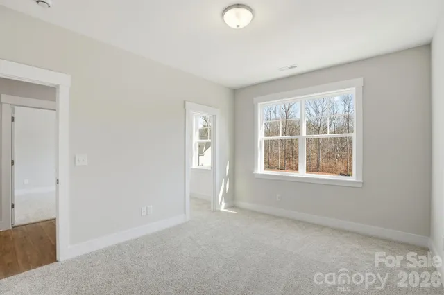 an empty room with windows