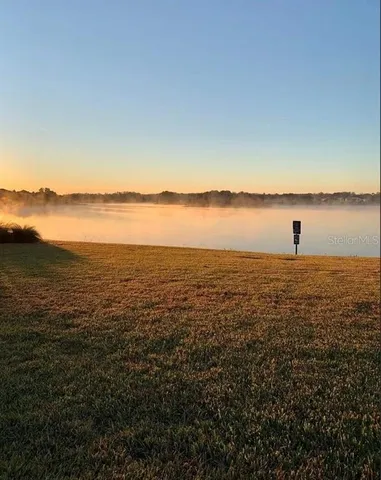a view of a lake from a city