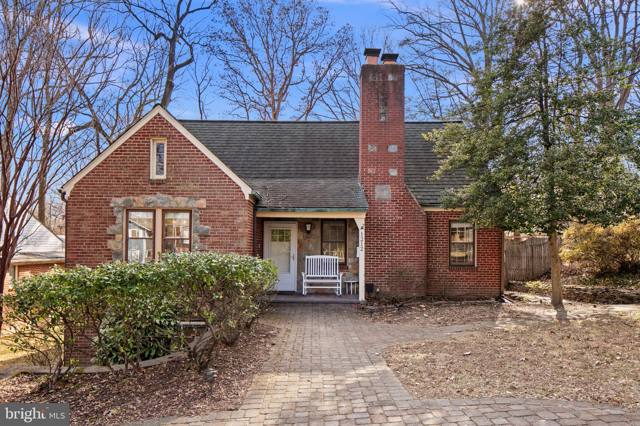1212 Dale Drive Silver Spring, MD 20910 - Photo 2 of 59 a front view of a house with a yard and garage