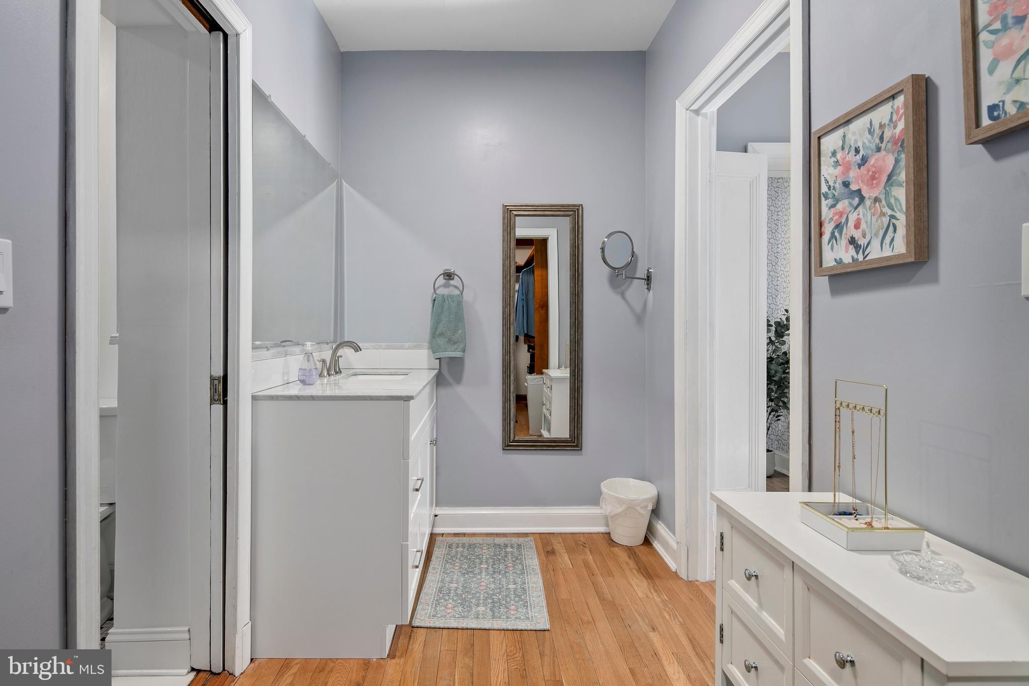 1212 Dale Drive Silver Spring, MD 20910 - Photo 21 of 59 a bathroom with a sink mirror vanity and toilet