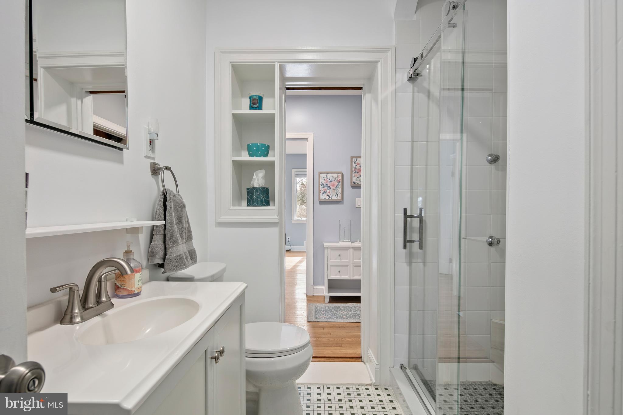 1212 Dale Drive Silver Spring, MD 20910 - Photo 23 of 59 a bathroom with a sink toilet and shower