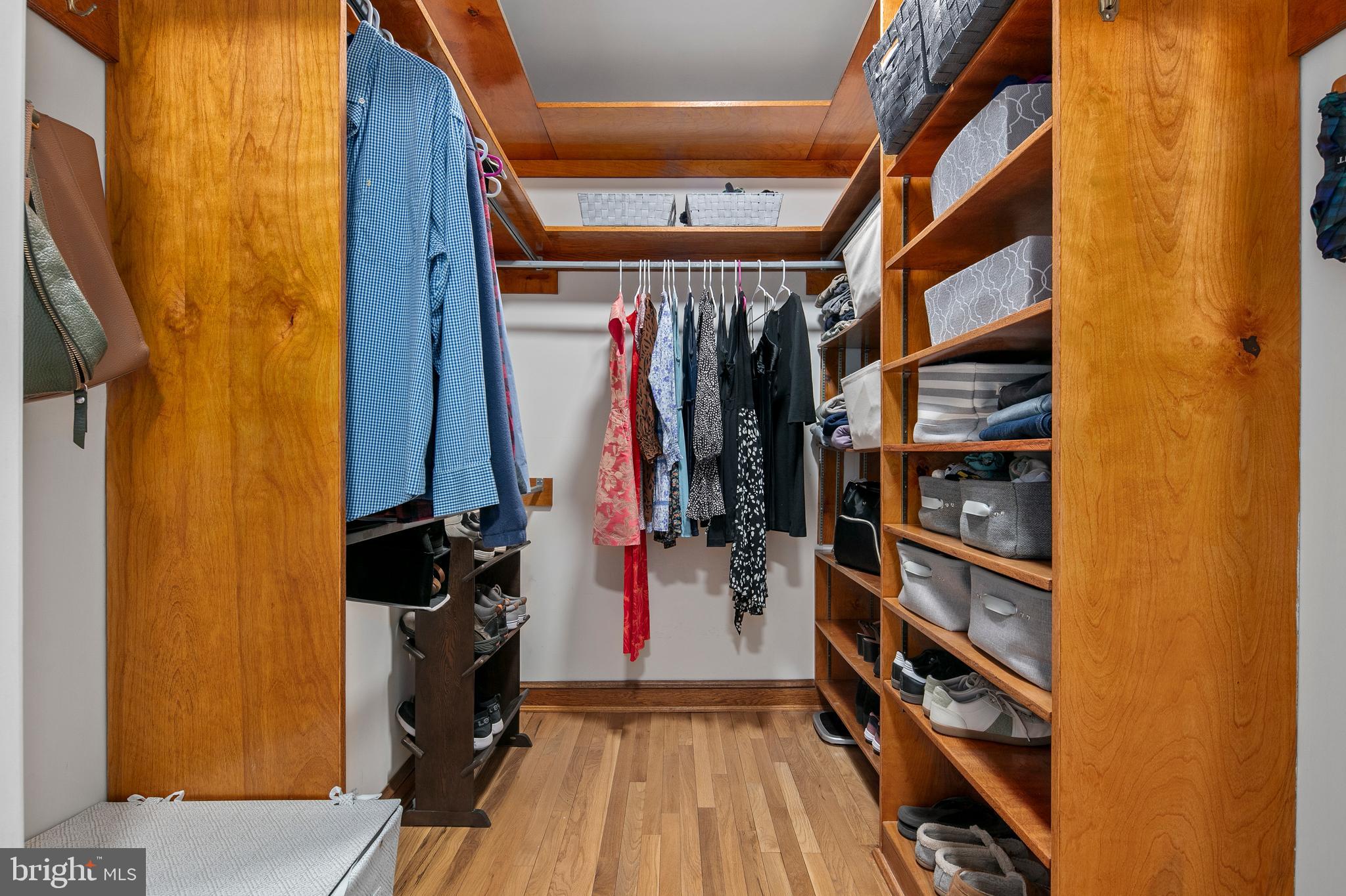 1212 Dale Drive Silver Spring, MD 20910 - Photo 25 of 59 a view of walk in closet with clothes and shoes