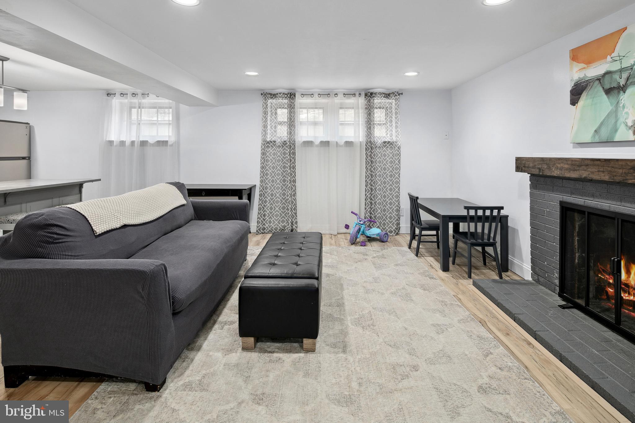 1212 Dale Drive Silver Spring, MD 20910 - Photo 36 of 59 a living room with furniture and a fireplace