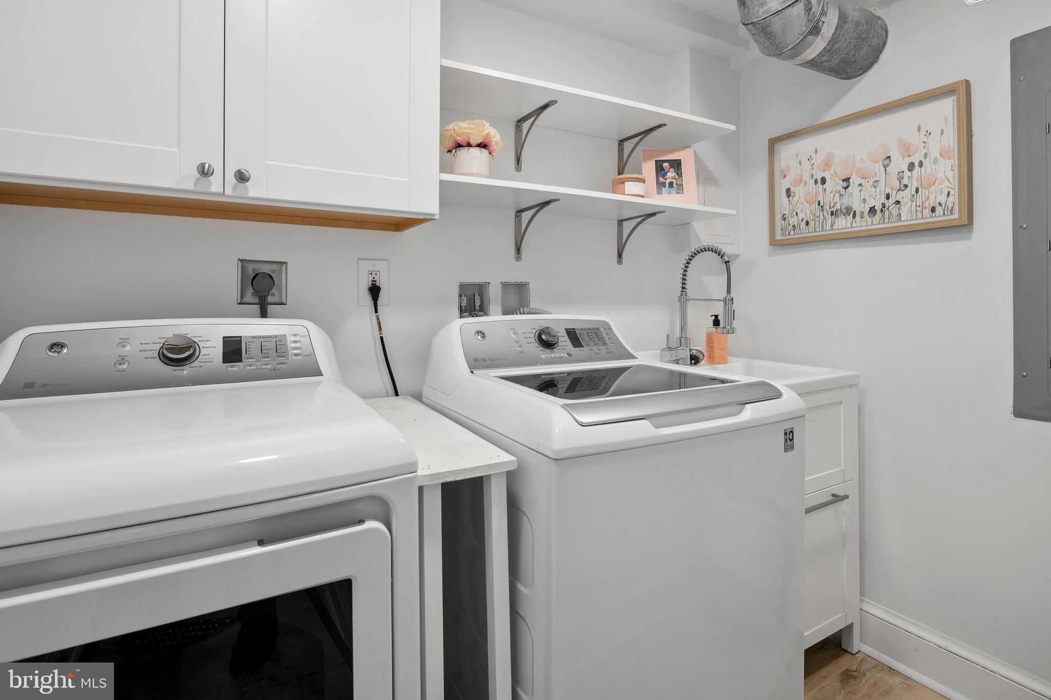 1212 Dale Drive Silver Spring, MD 20910 - Photo 47 of 59 a utility room with dryer and washer