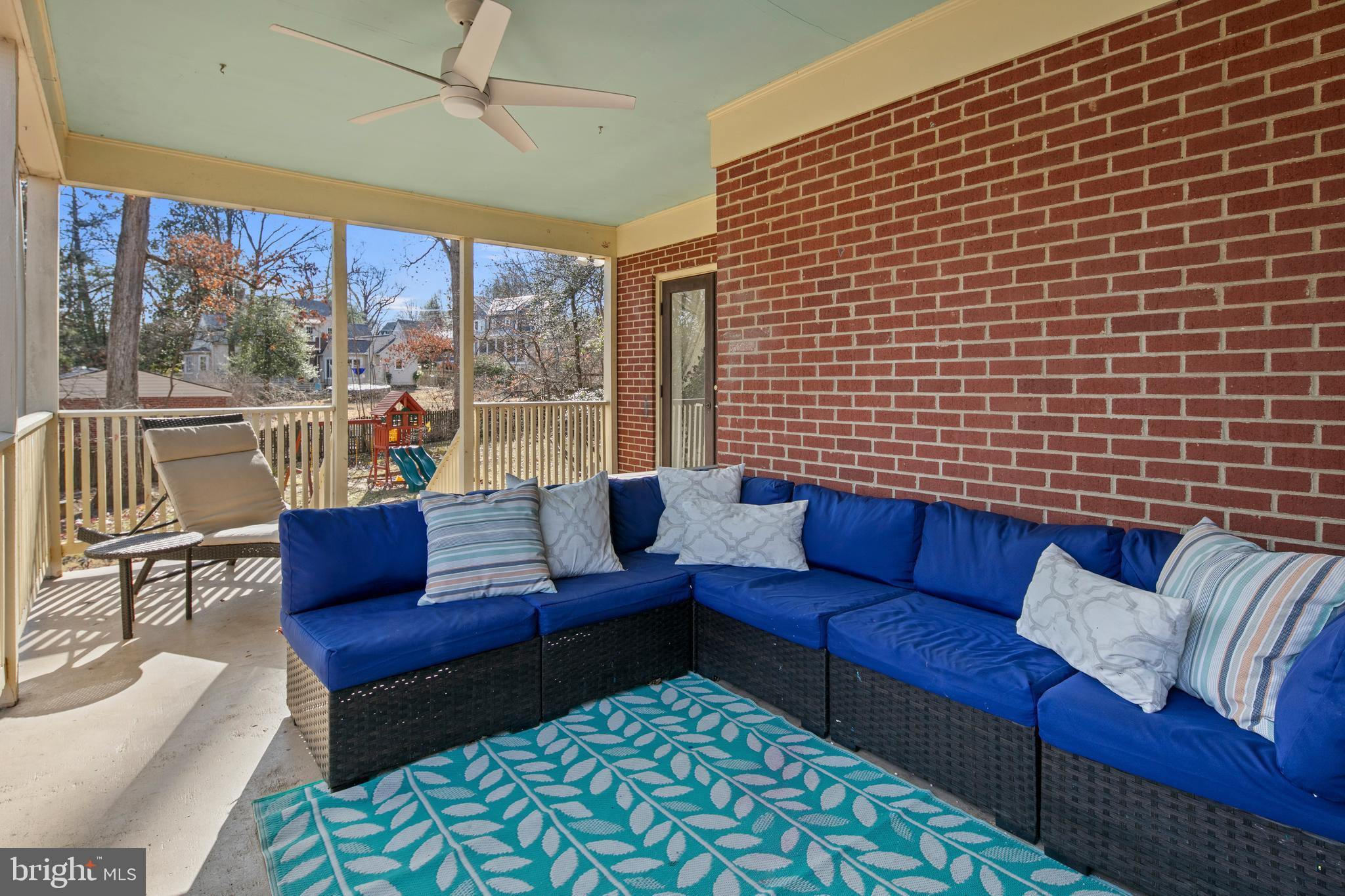 1212 Dale Drive Silver Spring, MD 20910 - Photo 49 of 59 a living room with furniture and a rug