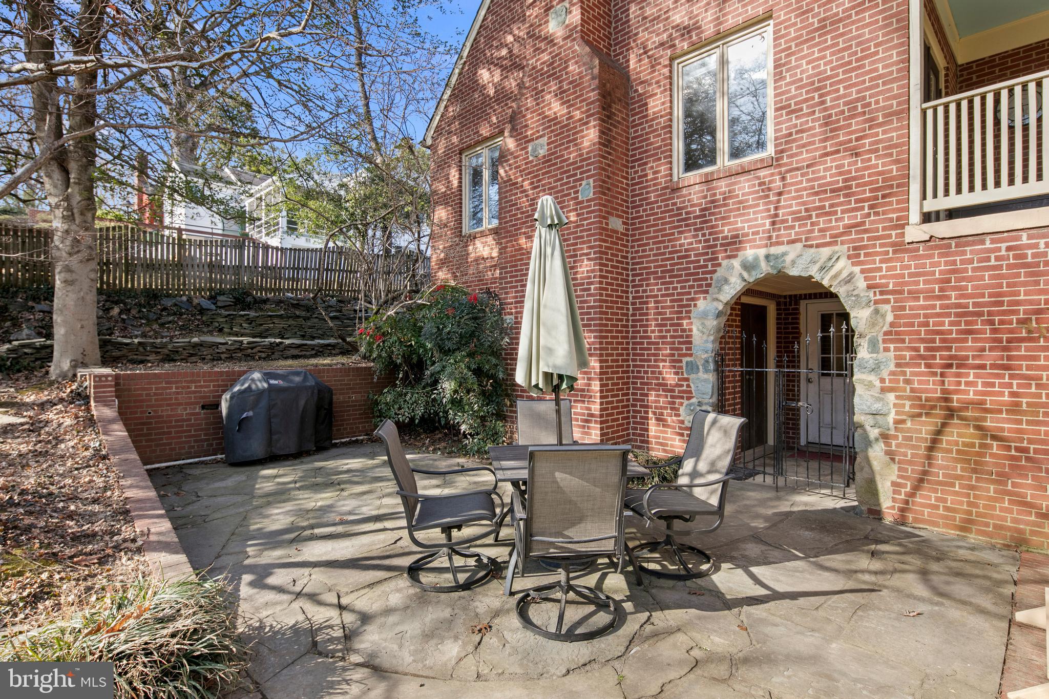 1212 Dale Drive Silver Spring, MD 20910 - Photo 53 of 59 a view of a patio with table and chairs and potted plants