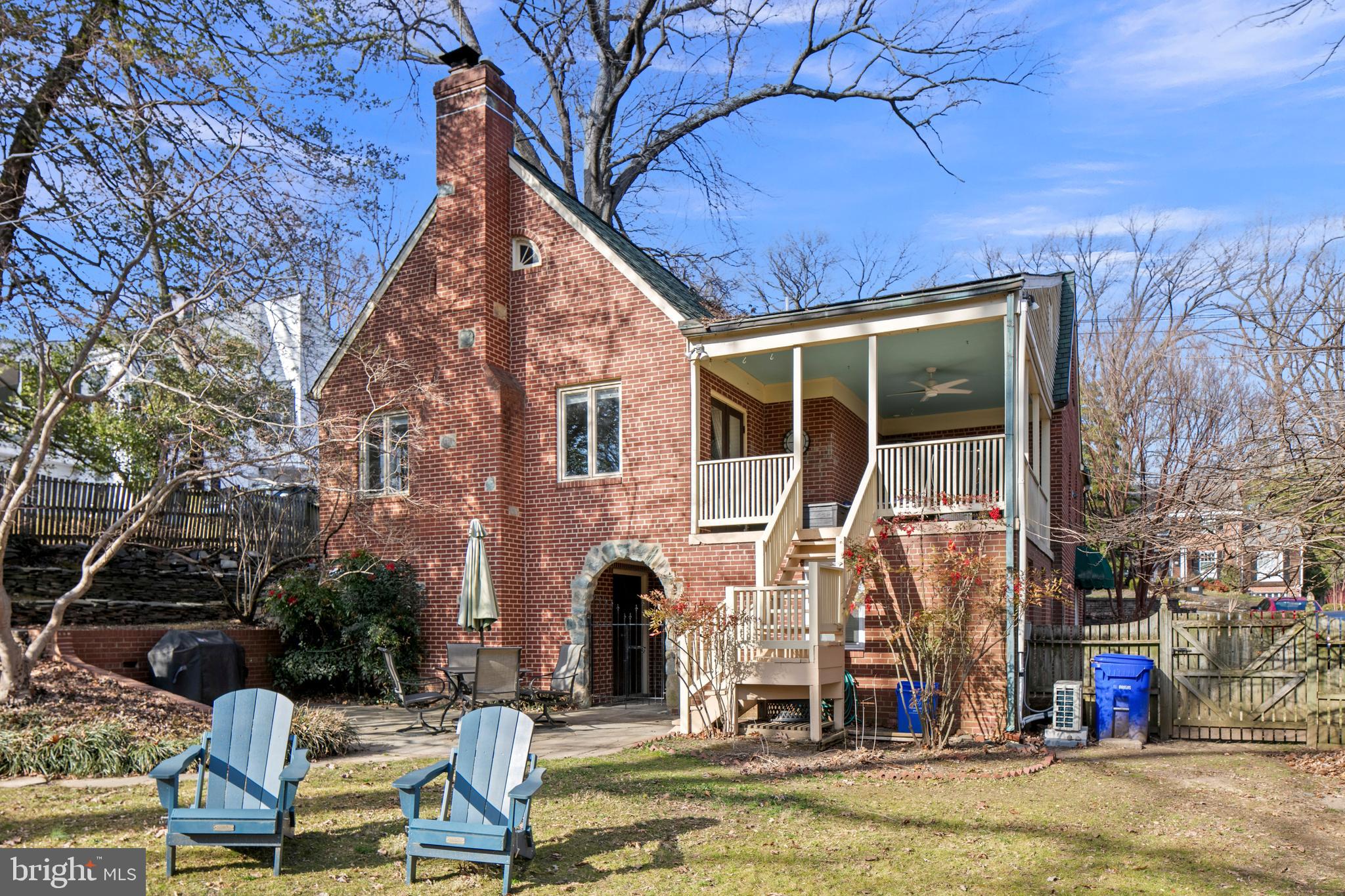 1212 Dale Drive Silver Spring, MD 20910 - Photo 56 of 59 a view of pool with two chairs and a table