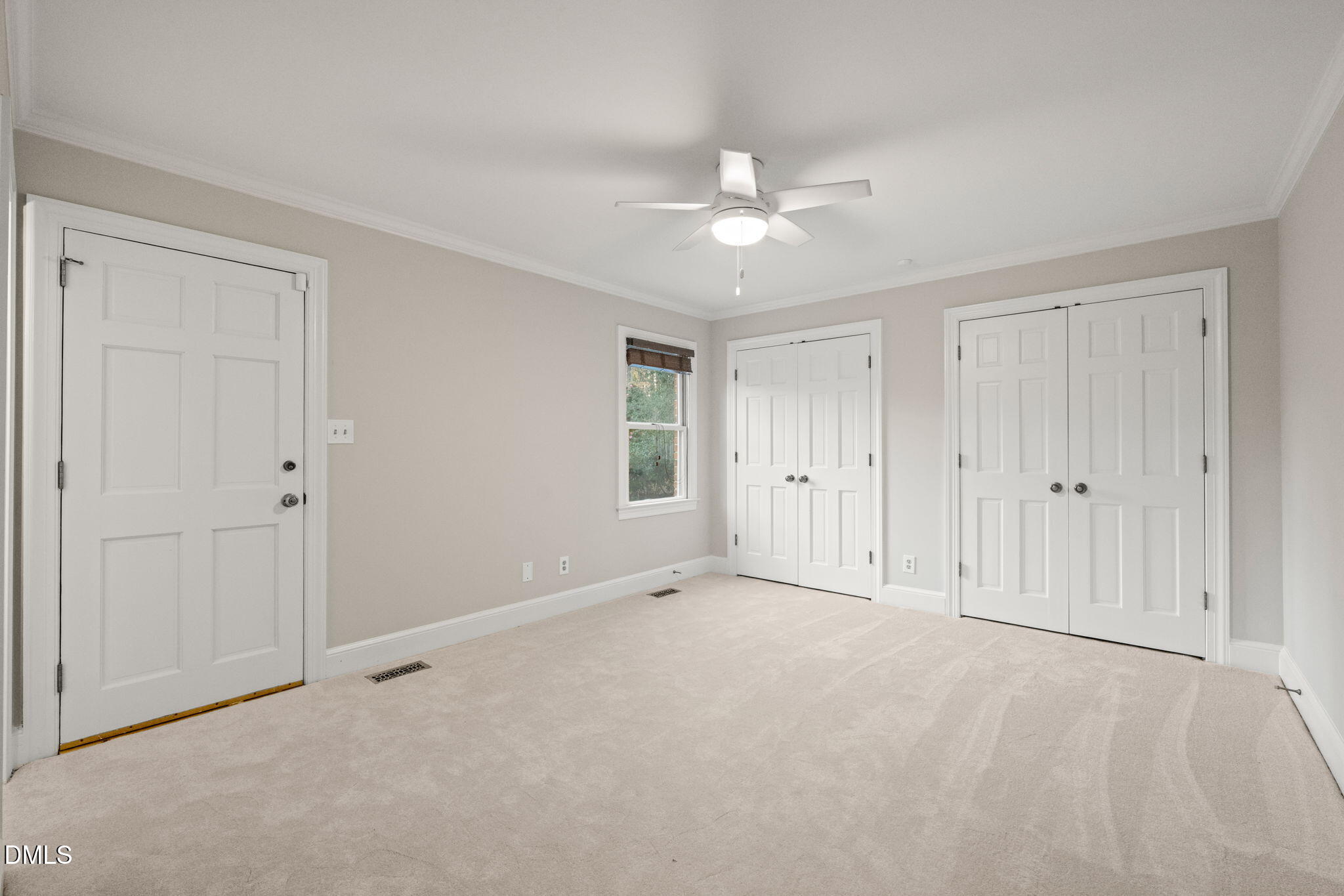 2300 Vly Frg Road Raleigh, NC 27615 - Photo 22 of 62 a view of an empty room with a ceiling fan
