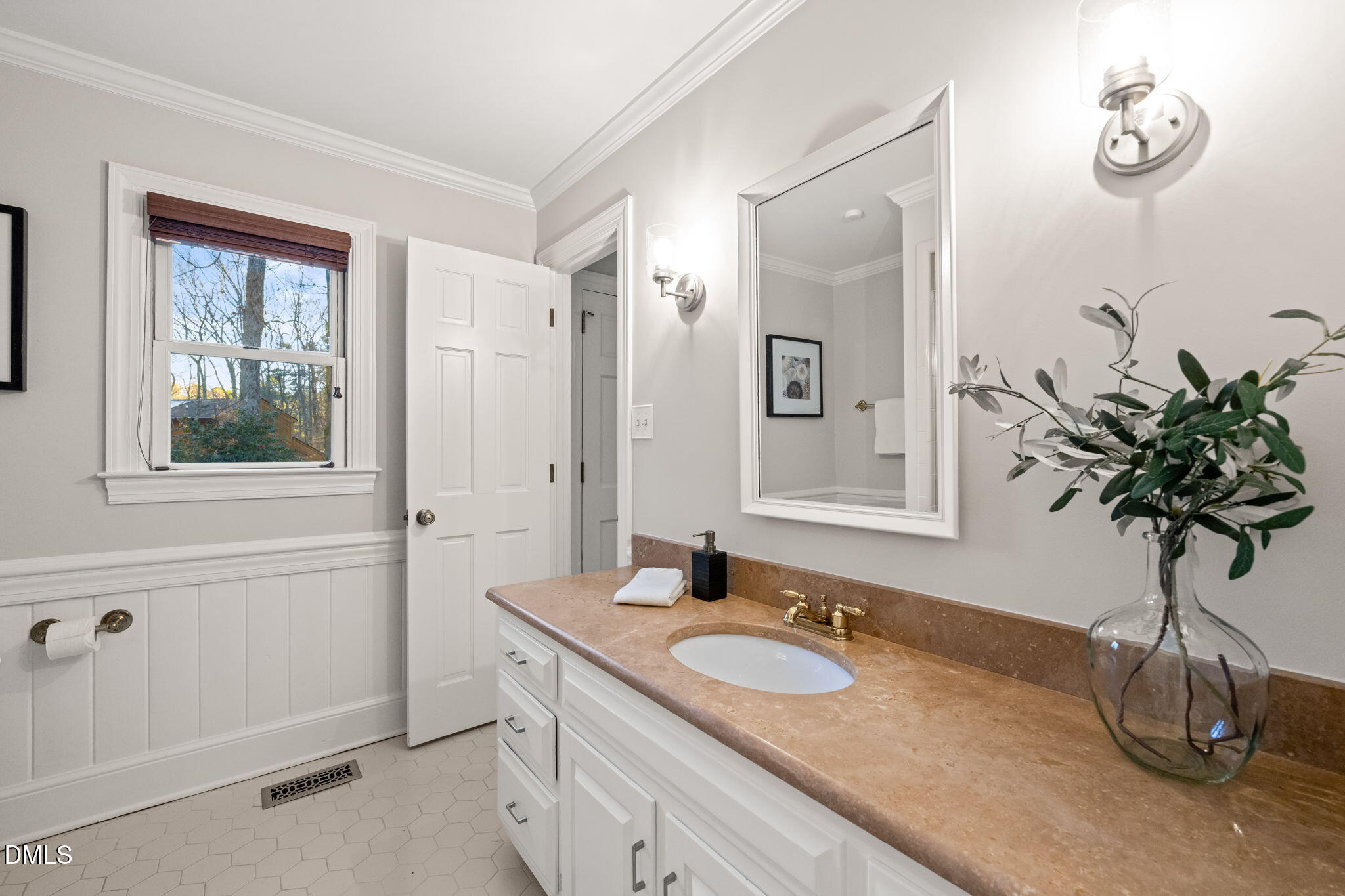 2300 Vly Frg Road Raleigh, NC 27615 - Photo 24 of 62 a bathroom with a granite countertop sink a mirror and a shower