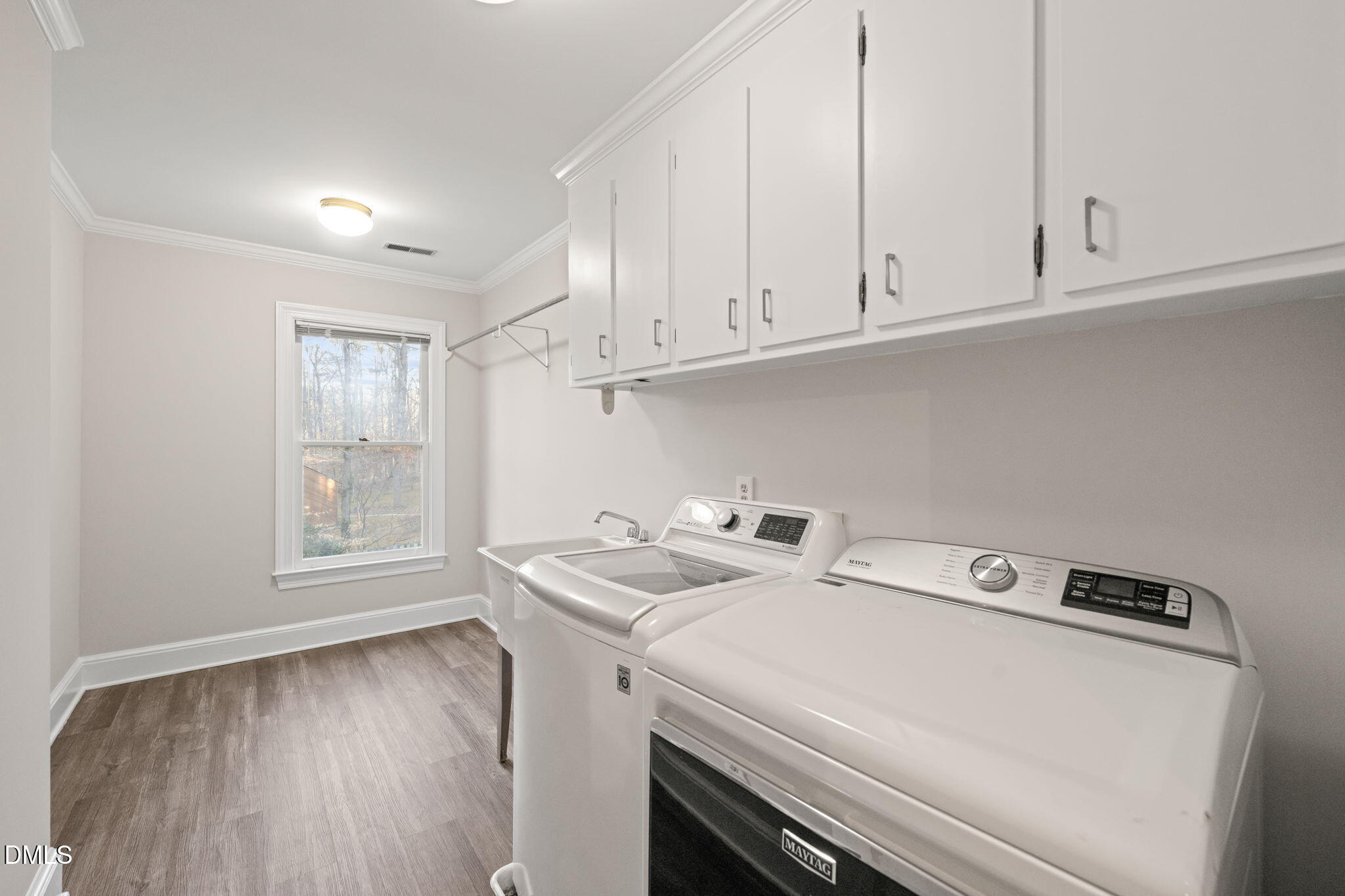 2300 Vly Frg Road Raleigh, NC 27615 - Photo 50 of 62 a utility room with dryer and washer
