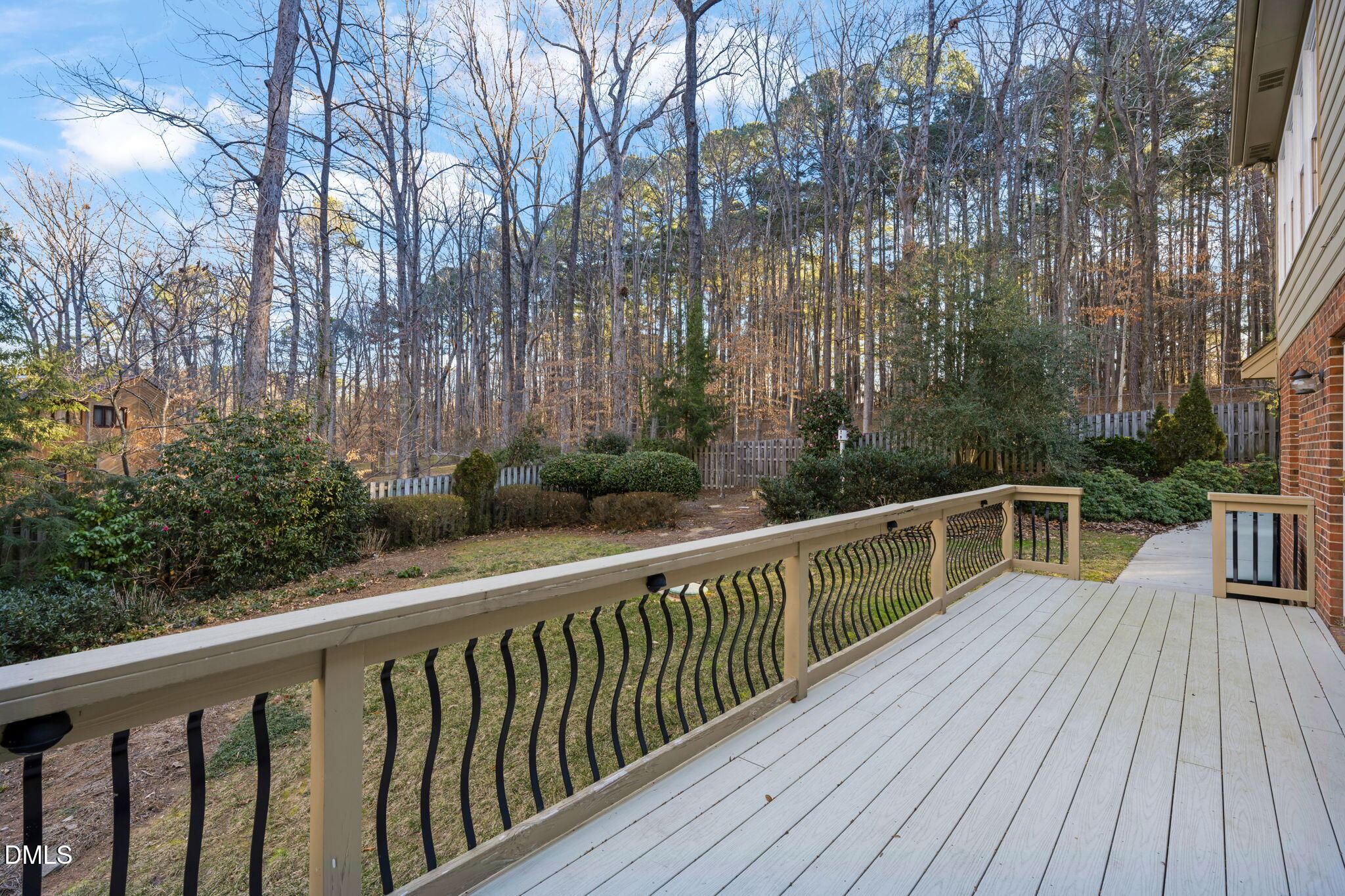 2300 Vly Frg Road Raleigh, NC 27615 - Photo 55 of 62 a view of a wooden deck with a yard